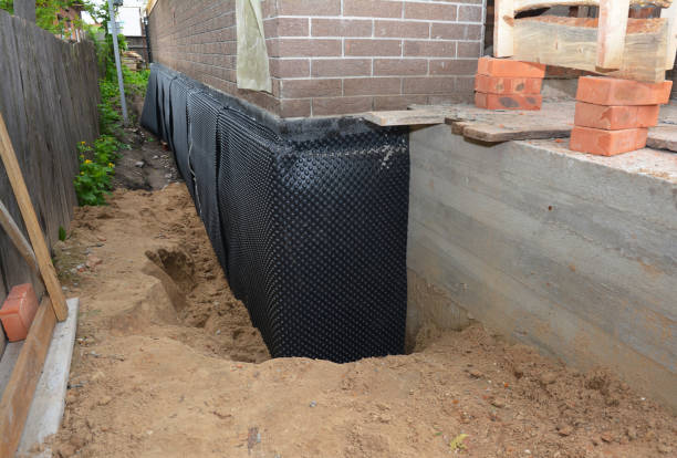 SJ Waterproofing Pros technician performing targeted Emergency Waterproofing assessment in Lemont, IL